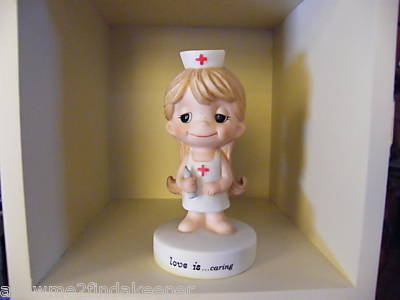 Love is... caring nurse figurine
