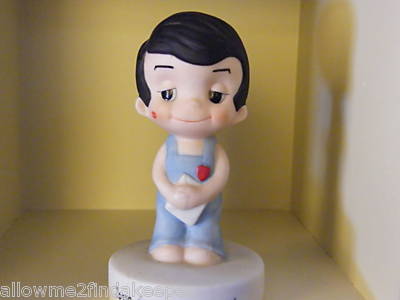 Love is... sweetheart boy figurine